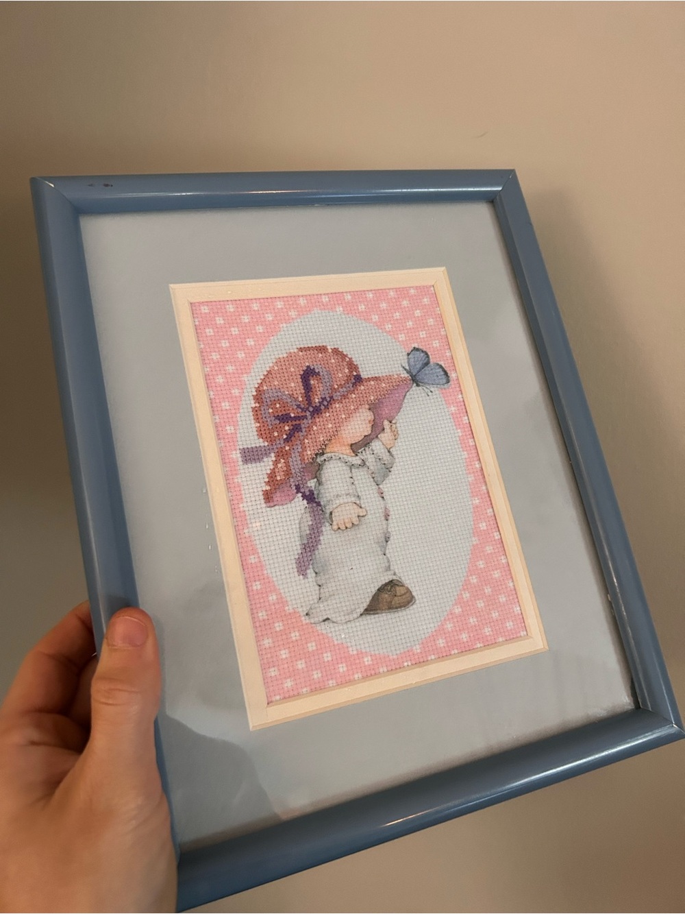 Cross Stitch Girl with Butterfly Framed Art - Blue Frame, Pink Background